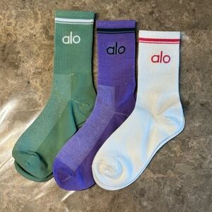 New Women’s Alo Socks
New with tags in its packaging 
3 pairs 
Fits sizes 6-11